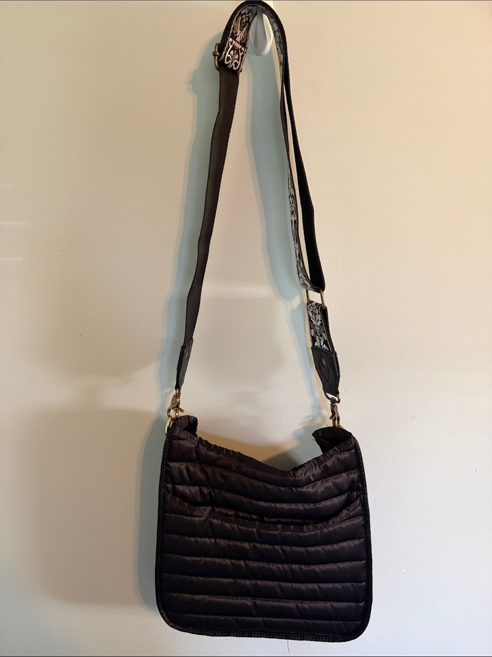 AhDorned quilted messenger bag with strap